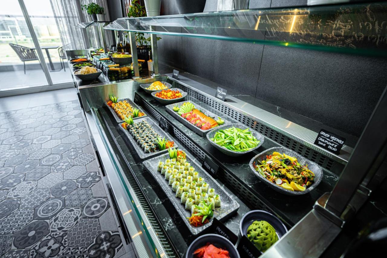 Movenpick Jumeirah Village Triangle Дубай Екстериор снимка A salad bar